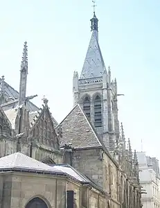 The bell tower (portion below balustrade from 13th century)