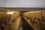 View from the exit stairs, with statues on the left and the right.