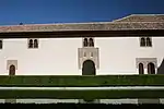 One of the lateral façades of the courtyard, looking east