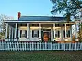 Pecan Place is an antebellum home that dates back to 1825.