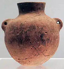 A red pot with two "ears"; by Peiligang culture; 6000–5200 BC; ceramic; Shanghai Museum