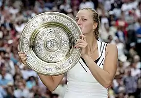 2011 Ladies singles champion Petra Kvitova  with the Rosewater Dish trophy