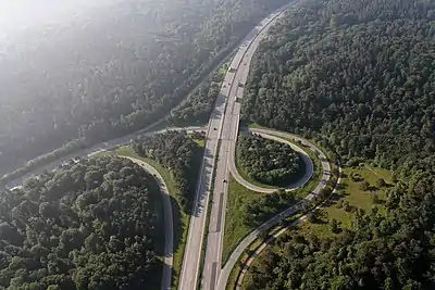 An intersection of the German A7 Autobahn near Hamburg showing slip roads as well as shoulders