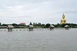 Phra Buddha Maha Nawamin Sakayamuni Sri Wisetchaichan or better known as Great Buddha of Thailand, principal Buddha image of Wat Muang a well-known local temple, regarded as the largest Buddha image in Thailand