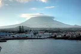 The village of Madalena at the western base of Mount Pico, as seen from the Faial-Pico Channel