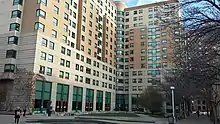 multi-story two-tone brown and light brown building