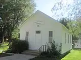 The former Pleasant Valley School has been relocated to Finnup Park in Garden City.