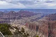 close-up and far views of the Tonto Group formations.Note in far view the cliff-run of the Tapeats Sandstone cliff below the (whitish)-greenish Bright Angel Shale-(often dull-greenish, but even yellowish in northeast Grand Canyon).