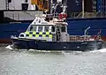 Police boat in Poole Harbour, Dorset, England