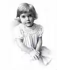 sweet, gentle graphite drawing of tow-headed toddler with white smocked collar dress in an intricate design