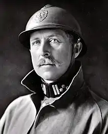 Albert wearing a military uniform with helmet