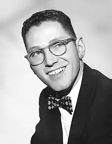 Tom Lehrer, retired musician and satirist. Lectured in American studies, Mathematics, and Musical Theater.