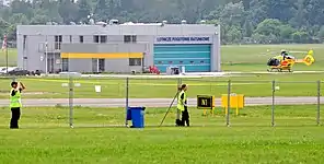 Helicopter ambulance Lifeguard 9 (R) waiting for an emergency dispatch at Ławica Airport.