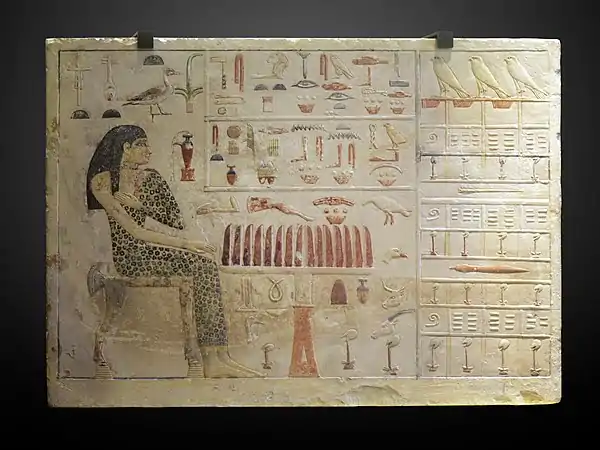 Stele of Princess Nefertiabet eating; 2589-2566 BC; limestone & paint; height: 37.7 cm (147⁄8 in.), length: 52.5 cm (205⁄8 in.), depth: 8.3 cm (31⁄4 in.); from Giza; Louvre (Paris). This finely executed relief represents the most succinct assurance of perpetual offering for the deceased