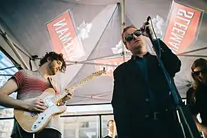 Casey performing live with Protomartyr in 2016