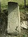 Khachkar monument beside the road leading to the village.