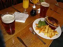 Pub grub - a pie, along with a pint. Public houses are a part of British, Irish, Scottish, and Australian culture.