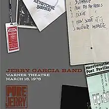 A hand-written set list, a Merriweather Post Pavilion ticket stub, a Keystone Berkeley napkin, two photos of Jerry Garcia as a stage magician conjuring a guitar from out of a hat, and a backstage pass for the Jerry Garcia Band