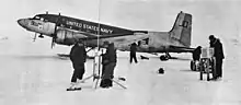 A LC-117D "Semper Shafters USMC" with ski landing gear and weather radar in the nose near the Beardmore Glacier, Antarctica, 1961.