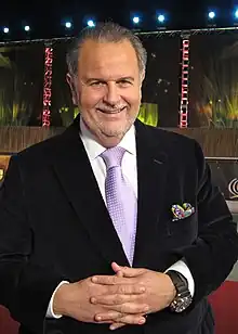 Photo of a large man wearing a suit