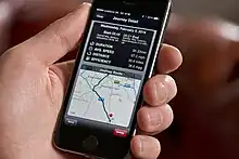 Image 6A user consulting a mapping app on a phone (from Smartphone)