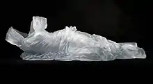 "Reclining Dress Impression with Drapery," a life-sized glass sculpture by Karen LaMonte.