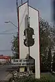 The monument at the entrance to Reghin, welcoming people