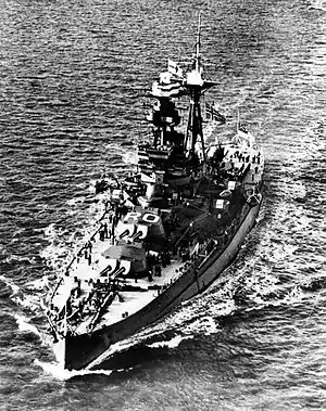 Aerial photograph of the ship. Both the Norwegian flag and White Ensign are visible