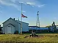 The old country schoolhouse. In this photo, the flag is half-mast because of the unmarked graves found at Indian residential schools