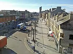 Elevated view of Main Street from the east with the tower of the town hall prominent