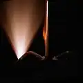 Thruster firing photographed in support of WINDEX experiment.