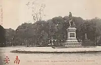 Statue of Rigault de Genouilly and the monument of Doudart de Lagrée in the background