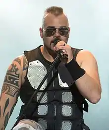 Joakim Brodén of Sabaton is known for wearing a distinctive vest with metal plates when performing with the band.