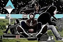 A cut-out picture of Sakanaction's band-members places in a landscape of grassy hills and black sky.