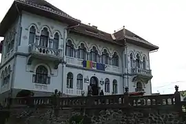 Eyes in Săliște. The building is Neo-Romanian, so it was most likely built in the 20th century, but has preserved the tradition of having eye-shaped roof windows.