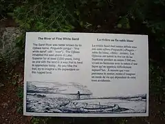 Historical Sign on the Bank of the River