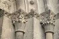 Typically intricate carved capitals and mouldings