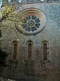 The rose window and lancets of the eastern end