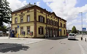 Two-story building with hipped roof