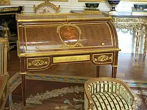 Roll-top desk of Marie-Antoinette; by Jean-Henri Riesener; 1784; oak and pine frame, sycamore, amaranth and rosewood veneer, bronze gilt; 103.6 x 113.4 cm; Louvre