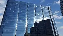 A large skyscraper with glass windows