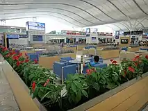 Business class passengers can rest in this area within the vast waiting hall.