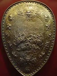 Shield of Henry II of France, steel damascened in silver and gold, design attributed to Etienne Delaune