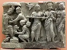 Slab with the scene from Shibi Jataka, Gandhara, 2nd–3rd century AD, British Museum.