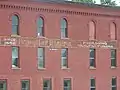 Signage detail on the northern elevation of the Brand Building