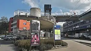 Circular stairwell carrying pedestrians over railway line