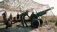 Spanish Marines manning an Oto Melara 105 mm pack howitzer in 1981