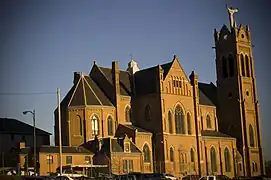 Saint Benedict the Moor (1968), atop tower of Saint Benedict the Moor Church, Pittsburgh, Pennsylvania.