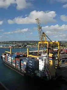 Image 4A container ship docked in the deep water harbour of Bridgetown, Barbados, which opened in 1961. (from History of the Caribbean)