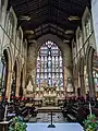 Stained glass window and altar.